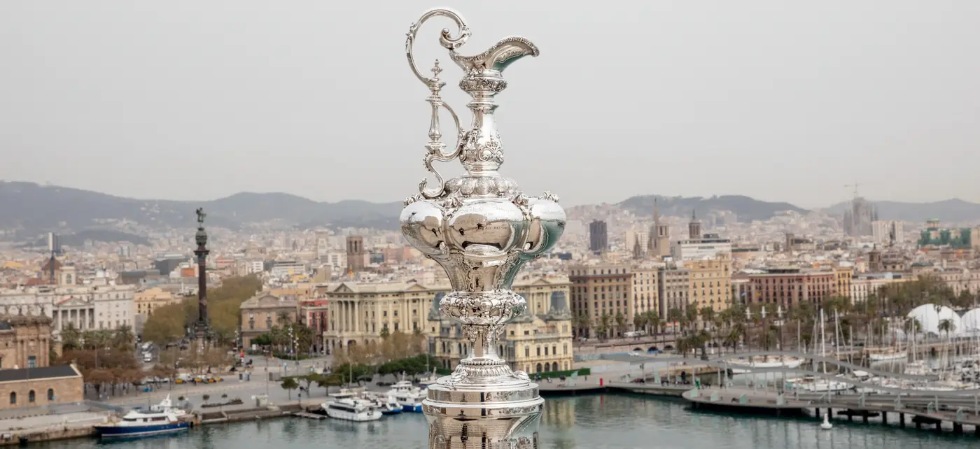 The America’s Cup trophy above the port and the old town of Barcelona